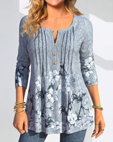 Blommig casual bluse med tryck och knappar